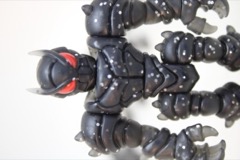 The GodBeast Glyos Void Sectavorian Action Figure