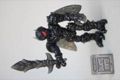 The GodBeast Glyos Void Sectavorian Action Figure