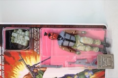 Locomotion Media Group Operation: Recall Mzimu Corps (Pecan) Action Figure